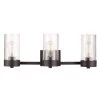 Axel 24 in. 3-Light Bronze Vanity Light with Seeded Glass Shades, Incandescent Bulbs Included by Globe Electric