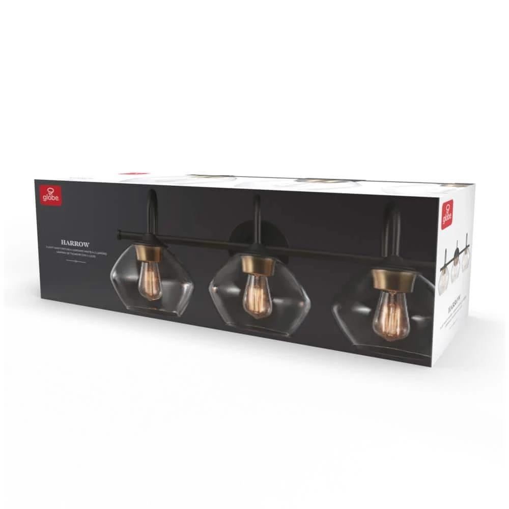 Harrow 26.3 in. 3-Light Dark Bronze Vanity Light with Antique Brass Accents and Clear Glass Shades by Globe Electric 6 Harrow 26.3 in. 3-Light Dark Bronze Vanity Light with Antique Brass Accents and Clear Glass Shades by Globe Electric - Image 6