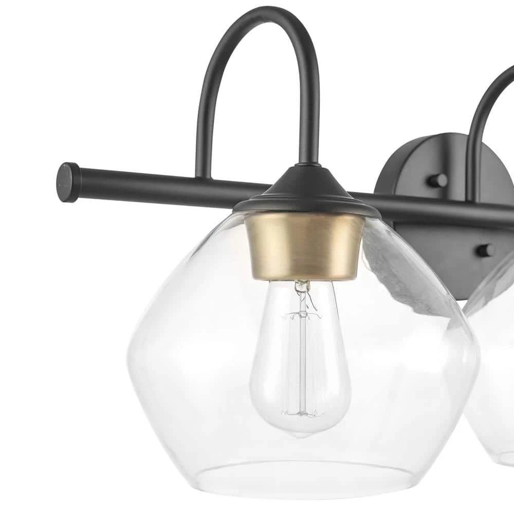 Harrow 26.3 in. 3-Light Dark Bronze Vanity Light with Antique Brass Accents and Clear Glass Shades by Globe Electric 3 Harrow 26.3 in. 3-Light Dark Bronze Vanity Light with Antique Brass Accents and Clear Glass Shades by Globe Electric - Image 3