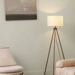 60 in. Faux Wood Floor Lamp with White Linen Shade and Tripod Base, On/Off Rotary Switch on Socket/ by Globe Electric -Deals Globe Electric Store faux wood globe electric floor lamps 91002854 c3 1000