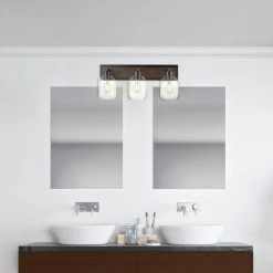 Williamsburg 24 in. 3-Light Matte Black Vanity Light with Faux Wood Accent, Clear Glass Shades by Globe Electric -Deals Globe Electric Store matte black globe electric vanity lighting 51708 4f 1000