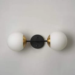 Celestia 2-Light Matte Black Wall Sconce with Antique Brass Socket and Matte Opal Glass Shades by Globe Electric -Deals Globe Electric Store matte black globe electric wall sconces 91002204 fa 1000