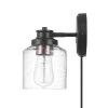 1-Light Matte Black Plug-In or Hardwire Wall Sconce with Seeded Glass Shade, In-Line On/Off Rocker Switch, 6 ft. Cord by Globe Electric