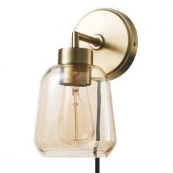 Salma 1-Light Matte Brass Plug-In or Hardwire Wall Sconce with Smoked Amber Glass Shade and In-Line On/Off Switch by Globe Electric
